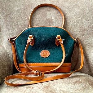 Dooney & Bourke hunter green and tan leather shoulder bag.